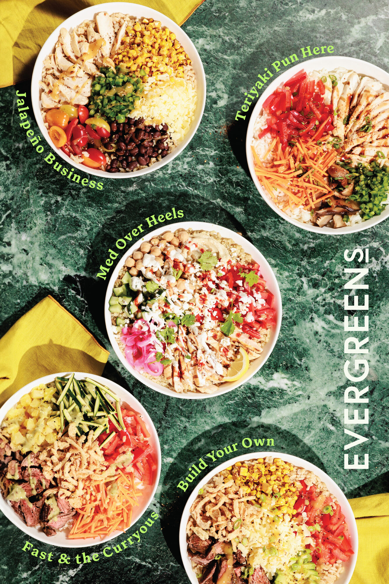 Seattle's best commercial food and hospitality photographer Five colorful salad bowls with playful names are arranged on a green marble surface, captured by Seattles best commercial food lifestyle photographer. The word EVERGREENS appears vertically on the right, with yellow napkins framing the corners. captured by seattle's best food and lifestyle photographer Brooke Fitts